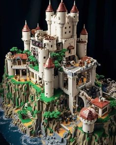 a lego castle built into the side of a cliff