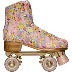 a pair of roller skates with colorful flowers on them