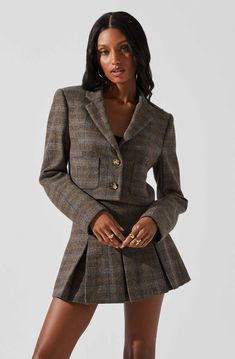 A cropped silhouette adds an on-trend touch to our Siarah Jacket—timelessly tailored and finished with front patch pockets and bold buttons. Pairs perfectly with our matching mini skirt, or wear it with jeans and a T-shirt for a laid-back weekend look. Fitted Cropped Jacket With Patch Pockets For Fall, Fall Cropped Jacket With Flap Pockets, Fall Cropped Jacket With Patch Pockets For Work, Casual Cropped Blazer With Buttons, Fall Workwear Cropped Jacket With Patch Pockets, Cropped Fall Blazer With Pockets, Chic Fall Tweed Jacket With Buttoned Pockets, Fall Cropped Jacket With Flap Pockets For Work, Cropped Outerwear With Buttoned Pockets For Fall