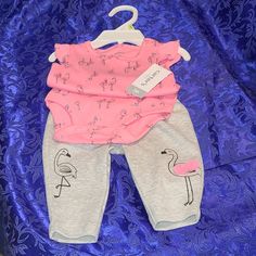 [Nwt] Carter's 3mos Flamingo Onesie & Leggings Set Super-Cute Pink Onesie With An All-Over Flamingo Print (Some Have On Sunglasses, Some Little Crowns, & Butterflies Flying Around- So Adorable!). Little Pink Bow By The Neck & Ruffle Cap Sleeves. 3 Snaps At Bottom. + Little Grey (Long) Pants/Leggings With 2 Flamingos - One On Each Leg. They're Looking At Each Other & Blushing, & The Left One Has 2 Pink Net Pompoms Attached. Absolutely Precious! See Photos For Details & Measurements From Tag. Come Pink Cotton Pants For Playtime, Cute Pink Bottoms For Playtime, Pink Cotton Playwear Pants, Pink Cotton Pants For Playwear, Pink Summer Playwear Pants, Pink Stretch Cotton Sets, Stretch Pink Cotton Sets, Pink Stretch Bottoms For Playtime, Stretch Pink Bottoms For Playtime