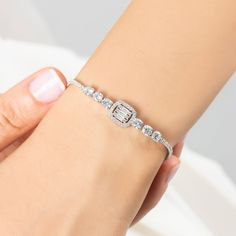 Beautifully crafted Silver Baguette CZ Diamond Cut Bracelet is the unique one of our tennis bracelet collection. Baguette Tennis Bracelet is made from high quality 925 solid sterling silver and multishaped and cutted white cubic zirconia stones. Elegant piece of our collection is available for daily using and for the classy events. This piece definitely will be the perfect match to your outfit and great gift idea for every special day. Baguette Cut Tennis Bracelet will add elegance to you and your loved ones.  This adorable Sterling Silver Baguette CZ Diamond Cut Tennis Bracelet jewelry is what you're looking for. * Material: High Quality Solid 925 Sterling Silver * Finish: Sterling Silver  * Chain: Adjustable 3 cm Extension * Gemstone: High Quality White Cubic Zirconia Stones PACKAGING IN Christmas Gift For Women, Bracelet Tennis, Diamond Jewelry Necklace, Jewelry Christmas, Diamond Chain, Baguette Cut, Bracelet Collection, Christmas Gifts For Women, Cz Diamond