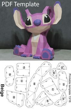 the paper toy is made to look like a pink and purple animal with big eyes