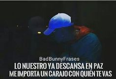 a person wearing a blue hat with the words bad bunny frases in spanish on it