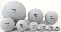 several cement balls are shown with measurements for each one in the center and five on the bottom