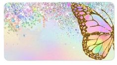 a colorful butterfly flying through the air with glitter on it's back end and wings