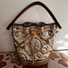 This Beauty Is Brand New And Hasn’t Been Used- Just Made An Impulsive Purchase And I’m Not A Huge Crossbody/Bucket Bag Person! Tags Were Removed But I Still Have Them As You’ll See In One Of The Attached Images. Dust Bag Included! Luxury Tan Pouch Shoulder Bag, Luxury Silver Leather Bucket Bag, Luxury Gold Bucket Bag With Detachable Strap, Luxury Gold Bucket Bag For Daily Use, Designer Gold Bucket Bag For Everyday Use, Luxury Gold Top Handle Bucket Bag, Designer Gold Rectangular Bucket Bag, Gold Bucket Bag With Dust Bag For Daily Use, Gold Luxury Crossbody Bucket Bag