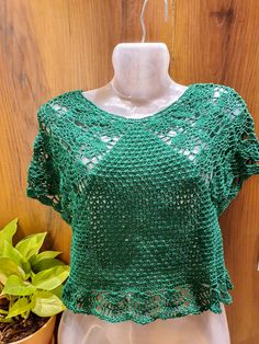 "A handmade crochet blouse/crop top with lacy sleeve. Its is made of cotton threads with an intricate pattern.  Bust Size- 32\" +/- Height- 18\" Occassion- Traditional wear, summer wear, casual wear It can be Custom made on order to preference for color and size" Crochet Lace Short Sleeve Blouse For Vacation, Short Sleeve Crochet Lace Beach Blouse, Summer Crochet Lace Short Sleeve Blouse, Summer Crochet Lace Blouse With Short Sleeves, Vacation Crochet Lace Top With Short Sleeves, Crochet Lace Short Sleeve Tops For Vacation, Casual Crochet Short Sleeve Blouse, Short Sleeve Crochet Top With Crochet Lace For Vacation, Casual Cotton Crochet Lace Dress