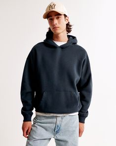 Elevate your casual wardrobe with the Abercrombie & Fitch Men's Essential Popover Hoodie. This piece combines comfort and style, making it a must-have for any fashion-forward individual.

- Size: XXXL
- Color: Navy Blue
- Material: Cotton, Polyester
- Gender: Male
- Features: SoftAF fabric, drop-shoulder fit, front pouch pocket, banded hem and cuffs

Crafted from a blend of cotton and polyester, this hoodie offers a soft touch and durable wear. The oversized design and drop-shoulder fit provide Male Features, Refined Fashion, Navy Hoodie, Men's Tops, Women Essentials, Oversized Hoodie, Men's Knit, Mens Essentials, Inspiration Mode