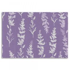 a purple and white floral pattern on fabric