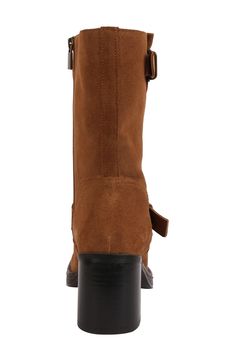 Add the edginess you crave to your ensemble with this leather boot brightened with polished buckles and lifted on a chunky block heel. 2 1/2" heel 7 3/4" shaft Cushioned footbed Leather upper/synthetic lining/rubber sole Imported Brown Moto Boots With Stacked Heel For Fall, Brown Wide Calf Boots With Block Heel, Suede Boots With Buckle Closure For Work, Brown Block Heel Moto Boots For Fall, Brown Ankle Moto Boots With Buckle Closure, Brown Ankle Moto Boots With Buckle, Fall Boots With Buckle Closure And Block Heel, Suede Workwear Boots With Buckle Closure, Brown Moto Boots With Block Heel For Fall