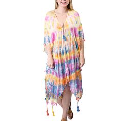 Vibrant Tie-Dye One Size Cover-Up in a longer length -perfect for lounging at the beach or pool. Tassel details make it whimsical and flirty. Wear with your favorite hat and shades. Details & Care One Size 100% Cotton 39.5"L x 35.5" W Hand wash. Dry flat. Imported Boho Tie Dye, Kimono Wrap, The Lane, Beach Cover Ups, Long Length, At The Beach, Women Empowerment, Effortless Style, Timeless Fashion