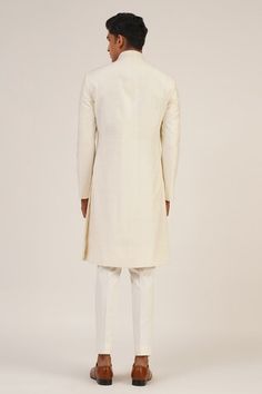 Ivory full sleeve sherwani with round high neckline. - Aza Fashions Off White Fitted Bandhgala Kurta, Off White Fitted Bandhgala Straight Kurta, Fitted Off White Bandhgala Straight Kurta, Classic Fitted Sherwani With Naqshi Detailing, Off White Long Sleeve Sherwani With Naqshi, Cream Long Sleeve Kurta For Reception, Classic Long Sleeve Sherwani With Naqshi, Classic Cream Kurta For Festive Occasions, Classic Cream Bandhgala For Festive Occasions