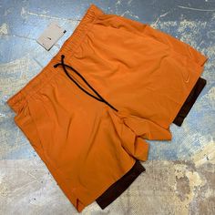 I’m Selling A Brand New With Tags Pair Of Nike Unlimited 7” Versatile Dri-Fit Men’s 2 In 1 Compression Lined Running Shorts In Orange With Brown Compression Shorts And An Embroidered Nike Check! Features Drawstring, Compression Shorts Lining And Side Pockets. Adult Xl Width Measures 18 Inches Hip To Hip Length Measures 17.5 Inches Hip To Leg Opening Inseam Measures 7 Inches Nike Id Dv9334-815 Msrp $70 Click Add To Bundlebelow To Receive An Offer! Combine Items And Save On Shipping! Orange Athleisure Activewear With Built-in Shorts, Orange Functional Running Activewear, Orange Athleisure Athletic Shorts With Built-in Shorts, Orange Nylon Sports Shorts, Orange Moisture-wicking Shorts Activewear, Orange Athletic Sportswear Shorts, Orange Training Shorts, Orange Moisture-wicking Activewear Shorts, Sporty Orange Training Bottoms