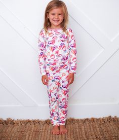 Get ready for the little's sweet, summertime slumber with our Beachy Keen Pajamas! Made from super soft bamboo, these cozy jammies are printed with bright and colorful seashells. Fun, comfy and colorful! 93% Bamboo; 7% Spandex Wash cold with like colors; stays soft wash after wash Fits snug; not treated with flame retardants Spring Playful Loungewear Sets, Playful Spring Loungewear Sets, Spring Loungewear Sets In Playful Style, Playful Sleepwear For Loungewear, Playful Stretch Sleepwear For Loungewear, Playful Fitted Loungewear Sets, Playful Spring Stretch Sleepwear, Playful Stretch Sleepwear For Spring, Playful Stretch Sleepwear