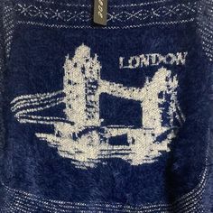 Pit To Pit 16” Size Tag Says One Size I Would Say S/M Has And Image Of London Bridge On The Back Long Sleeve Open Front It Is So Soft With A Fuzzy Texture And A Beautiful Deep Blue Blue Crew Neck Trendy Cardigan, Trendy Blue Crew Neck Cardigan, Cozy Blue Crew Neck Cardigan, Womens Grey Sweater, Balloon Sleeve Cardigan, Brown Flannel, Fuzzy Texture, Jersey Cardigan, Aztec Cardigan