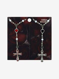 Cross my heart and hope to die  you're my bestie for life! This matching necklace set features a gothic cross full of rhinestones  plus a heart charm and more beads up top.18" + 3" extenderNickel-free alloy; resin; acrylicSet of 2Imported Matching Jewelry For Best Friends, Matching Stuff For Best Friends, Dr Bedroom, Shoping Cart, Cross Gothic, Affliction Clothing, Hello Kitty House, Best Friend Necklace, Emily The Strange