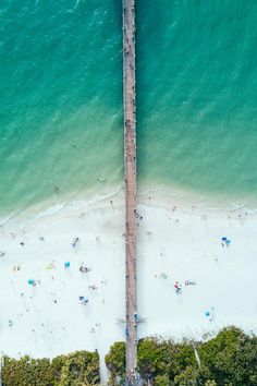 an aerial view of the beach and ocean