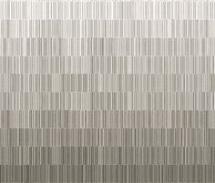 a white and grey wall with vertical lines on it