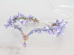 a headband with purple flowers on it