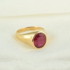 > Material - 14K Solid Yellow Gold  > Gemstone - Natural Ruby > Gemstone Shape - oval > Gemstone Weight - 3.360 Ct  > Gross Weight - 6.05 Grams Any jewelry that carries a Ruby signifies so much passion and love between two people, that it makes Ruby an ideal choice for engagement or Valentine's Day jewelry.  "A drop of the heart's blood of Mother Earth" is how the ruby is described in the Orient. The Indians call the ruby Ratnanayaka, the lord of the gemstones. The ruby is associated with the sun and was thought to preserve mental and physical health. You can also go to my shop Home for more:  https://www.etsy.com/shop/TheJewelVine We Are Committed To Maintaining A High Standard Of Serves To Our Customers. Kindly let me know if you have any questions about this product. We offer free resiz Ruby Gold Ring, Oldies But Goodies, Ring Minimalist, Minimalist Ring, July Birthstone, Ruby Gemstone, Yellow Gold Ring, Minimalist Rings, Natural Ruby