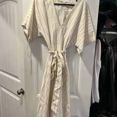 It Is A Gianni Bini Size 2 Dress Never Worn Beige V-neck Lined Midi Dress, Cream V-neck Dress For Day Out, Cream V-neck Lined Dresses, Cream Cotton Short Sleeve Dress, Cream Cotton Dress With Short Sleeves, Casual Cream Maxi Dress With Short Sleeves, Neutral Cotton Short Sleeve Dress, Casual Cream Short Sleeve Maxi Dress, Cream Cotton Midi Dress For Daywear