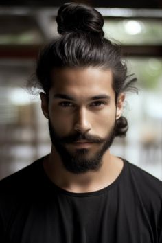 If you want to make a statement, consider sporting double man buns as your long hairstyle. This playful and eye-catching look is particularly suited for men with wavy hair. Click here to check out more irresistible long hairstyles for men. Buns For Long Hair, Man Buns, Ab Workout Men