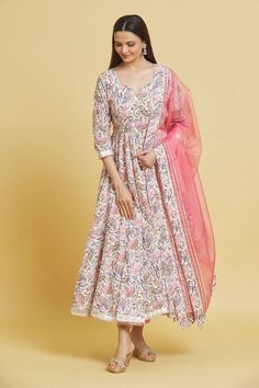 Baby pink cotton anarkali with lotus print and gota embroidered borders. Comes with pant and an organza dupatta.
Components: 3
Pattern: Printed, Embroidered
Type Of Work: Lotus, Gota
Neckline: Leaf Neck
Sleeve Type: Three quarter
Fabric: Cotton, Dupatta: Organza
Color: Pink
Other Details: 
Closure: Anarkali and Pant - Drawstrings
Occasion: Mehendi and Haldi - Aza Fashions Anarkali Cotton Salwar Kameez With Gota Work, Cotton Wedding Sets With Printed Border, Designer Cotton Anarkali Set For Festivals, Designer Cotton Anarkali Set With Dupatta, Designer Cotton Anarkali Set For Diwali, Cotton Anarkali Set With Gota Work For Festive Occasion, Cotton Salwar Kameez With Block Print In Traditional Drape, Cotton Anarkali Set For Festivals With Traditional Drape, Semi-stitched Cotton Anarkali Set For Wedding