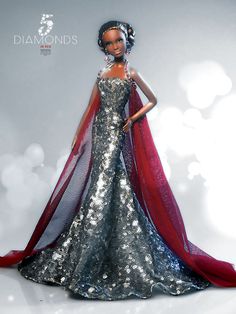 a barbie doll wearing a silver and red dress