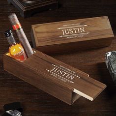 two wooden boxes with cigars on top of them