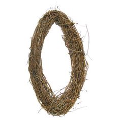 a wreath made out of twigs on a white background