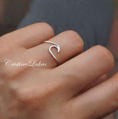 This simple and cute ocean wave ring that can be worn separately or stacked with other rings. Amazingly young look for daily casual wear. Order in Sterling Silver, or Sterling Silver with Yellow or Rose Gold Overlay Metal options: - Sterling Silver, 0.925 - Sterling Silver, 0.925 with Yellow Gold Adjustable Wavy Promise Rings, Minimalist Wavy Rings As A Gift, Minimalist Wavy Rings For Gift, Minimalist Wavy Rings As Gifts, Minimalist Stackable Wavy Rings, Adjustable Wavy Rings As A Gift, Gift Wavy Stackable Rings, Gift Stackable Wavy Rings, Wave Ring Silver