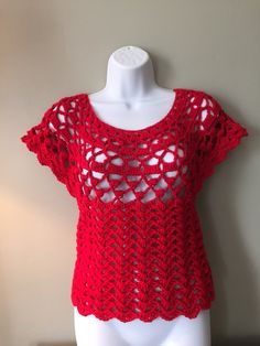 Handcrafted from acrylic yarn. Beautiful vibrant red color will enhance your life energy. Light and breezy it will be nice addition to your summer wardrobe. Measurements: Length - 20" ( 51 cm) Width at the shoulders - 23" ( 59 cm)             under the bust - 15" ( 38 cm) Fits size S Red Crochet Top For Summer, Red Crochet Top For Summer Vacation, Red Sleeveless Crochet Top, Red Fitted Crochet Lace Top, Red Crochet Beach Top, Bohemian Red Crochet Lace Top, Red Crochet Lace Casual Top, Red Casual Crochet Lace Top, Red Crochet Top For Beach