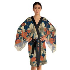 Whether it's lounging at home or making a stylish appearance, these kimono-style robes are as beautiful as they are cozy. With a figure-flattering shape, this chic mid-length robe features the signature flowing bell sleeves and a belt, making it an absolute delight for Japanese style enthusiasts. Each kimono is 100% made with Polyester for that smooth & silky feel. .: 100% polyester .: Light fabric (4.72 oz/yd²(160g/m .: Figure-flattering and versatile shape .: Smooth feel Multicolor Wrap Robe For Loungewear, Blue Robe With Kimono Sleeves For Home, Multicolor Floral Print Kimono For Home, Blue Kimono Sleeve Robe For Home, V-neck Printed Kimono, Elegant Long-sleeved Kimono With Floral Embroidery, Belt Making, Cheap Multicolor One-size Kimono, Multicolor Floral Print Cover-up With Kimono Sleeves