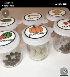 six plastic containers filled with different types of food and labeled in the words pumpkin on them