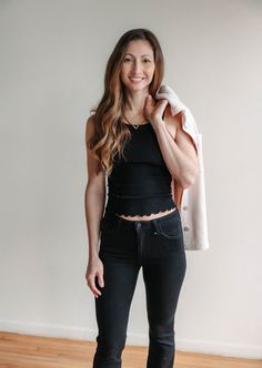 Forever timeless tank top featured in a sleeveless silhouette and soft ribbed fabrication with a crew neckline. Slim-fitting, hip-length. Features soft ribbed fabrication, crew neckline, chunky trim, classic cut and scalloped bottom. Why We <3 It: This easy tank is a wear-everywhere everyday essential. Jenn is wearing an xs/s. Classic Everyday Seamless Tank Top, Everyday Solid Tank Top, Bra Friendly, Everyday Tank Top With Built-in Bra And Minimal Stretch, Versatile Seamless Compressive Tank Top, Solid Seamless Tank Top With 4-way Stretch, Hip Length, Everyday Essentials Products, Capsule Wardrobe, Crew Neckline