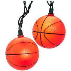 two orange basketball lights hanging from strings