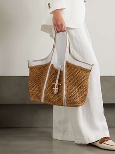 TOD'S T Timeless leather-trimmed raffia shoulder bag | NET-A-PORTER Designer Tan Bag With Braided Handles, Designer Tan Bags With Braided Handles, Luxury White Woven Bags, Luxury Tan Shoulder Bag With Braided Handles, Luxury Woven Bags For Errands, Luxury Woven Bag For Errands, Luxury White Bag With Leather Trim, Luxury White Bags With Leather Trim, Designer White Shoulder Bag With Leather Trim