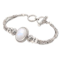 Rainbow Moonstone Pendant Bracelet from Bali - Rare Moon | NOVICA Artisan Moonstone Jewelry, Spiritual Oval Sterling Silver Bracelet, Adjustable Mystical Silver Bracelet, Adjustable Silver Mystical Bracelet, Adjustable Elegant Sterling Silver Bracelet With Moonstone, Spiritual Sterling Silver Moonstone Bracelet, Adjustable Elegant Sterling Silver Moonstone Bracelet, Elegant Adjustable Sterling Silver Moonstone Bracelet, Rainbow Moonstone Pendant