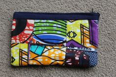 Kitenge Patchwork coin purse Perfect to carry money, card or as a mini make up bag Zip fastening Washable Made in Tanzania with love Multicolor Pouch Coin Purse For Daily Use, Daily Use Multicolor Pouch Coin Purse, Multicolor Zipper Pouch Coin Purse, Multicolor Pouch Wallet For Personal Use, Multicolor Pouch Wallet, Multicolor Coin Purse With Zipper, Compact Multicolor Travel Bags, Multicolor Pouch Wallet For Daily Use, Multicolor Zipper Clutch Coin Purse