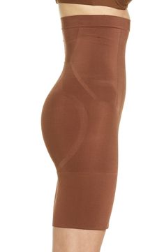 This sculpting shaper is lightweight and powerful, featuring fully-bonded front-panels for a flat stomach and edge-bonded side panels for squeeze-free slimming. Support level: sculpt Comfortable sculpting power with less bulk Lined double gusset Bonded tummy panel Side panels for squeeze-free slimming and easy movement Leg openings stay invisible under clothing Easy double-gusset opening 80% nylon, 20% spandex Machine wash, dry flat Imported Mid Thigh Shorts, Flat Stomach, Chestnut Brown, Side Panels, Panel Siding, Chestnut, Wedge Boot, High Waist, Nordstrom