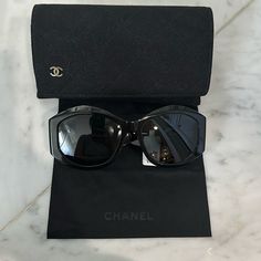 Authentic Chanel Sunglasses From Their Latest Collection. Comes With Original Case And Dust Cloth. Please See My Email That I Provided For Proof Of Purchase Directly From Chanel.Com. Oval Sunglasses Acetate Black Frame. Grey Gradient Lenses. Luxury Black Sunglasses For Travel, Elegant Travel Sunglasses With Mirrored Lenses, Elegant Mirrored Sunglasses For Travel, Elegant Formal Sunglasses With Uva Protection, Elegant Glass Sunglasses For Travel, Chanel Chain, Sunglasses Logo, Sunglass Chain, Chanel Logo