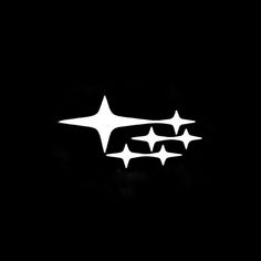 three white stars on a black background