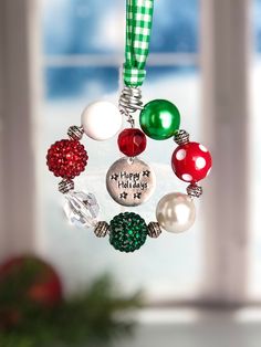 a christmas ornament hanging from a window