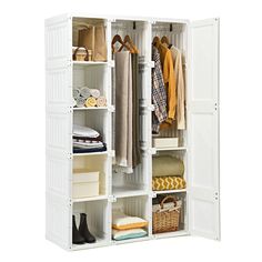 an open white closet with clothes and shoes