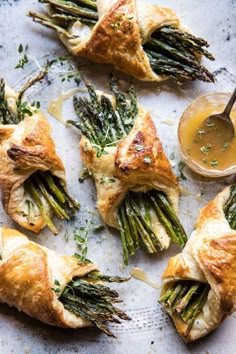 asparagus and cheese pastries with dipping sauce