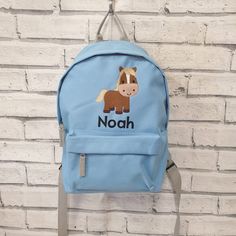 This cute personalised backpack is now available in 2 sizes  TODDLER SIZE Bag Dimensions- 23x35x12cm  Capacity- 6 Litres  JUNIOR SIZE 28x38x19cm Capacity 12 litres  Can fit an A4 folder. Both come with adjustable padded Shoulder straps and padded back panel for comfort and made from 600D polyester.  PLEASE NOTE THE GREY BAG DOES NOT COME WITH PADDED STRAPS BUT ARE FULLY ADJUSTABLE. Comes embroidered with a beautiful cute horse design and name of choice. Great bag to use for nursery, school or tr Horse Boys, Horse Backpack, Embroidered Horse, Personalized Backpack, Grey Bag, Nursery School, Bag School, Horse Designs, Cute Horses