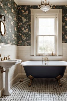 Experience timeless elegance with this small Victorian-inspired bathroom, featuring a classic clawfoot tub and sophisticated vintage wallpaper. Where history meets modern comfort. #VictorianStyle #SmallSpaces #VintageBathroom Toilet Vintage Design, Victorian Home Bathroom Remodel, Victorian Cottage Bathroom, Vintage Victorian Bathroom, Clawfoot Tub Tile Surround, Small Clawfoot Tub Bathroom, Small Bathroom With Freestanding Tub, 1890s Bathroom, Claw Tub Bathroom Ideas