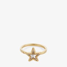 Elegant and timeless, the JC Star ring is a true example of Jimmy Choo glamour. Italian-crafted in gold-finish metal, the ring connects to a star that is embellished with sparkling Swarovski crystals. Slip on and cue compliments. Star Accessories, Designers Jewelry Collection, Preppy Jewelry, Metal Star, Designer Rings, Metal Stars, Jewelry Lookbook, Stacked Jewelry, Star Ring