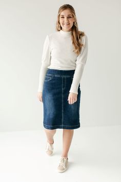 Simple lines, classic and comfortable, the 'Sara' is everything a denim skirt should be. This skirt is made from a quality stretch denim and is as comfy as they come! Featuring a wide waistband for extra comfort and ease of styling. Exclusively designed by us for you. 85% Cotton 12% Polyester 3% Spandex Machine Wash Cold Do Not Bleach Hang to Dry Low Iron if Needed Do Not Dry Clean Functional Back Pockets Available in 21", 24", and 26" length Model A Height 5'8" | Wearing Size 10 in 26" Length M Code Outfit, Modest Dressing, Christian Clothes, Dark Denim Skirt, Keds Style, Canada Fashion, Modest Skirts, Modest Clothing, Elegant Shirt