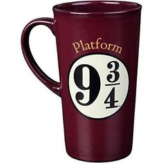 a red coffee mug with the number nine on it's front and bottom half